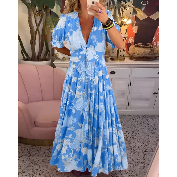 Carine - Blomsterprintet lommekjole med V-hals