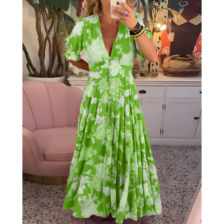 Carine - Blomsterprintet lommekjole med V-hals