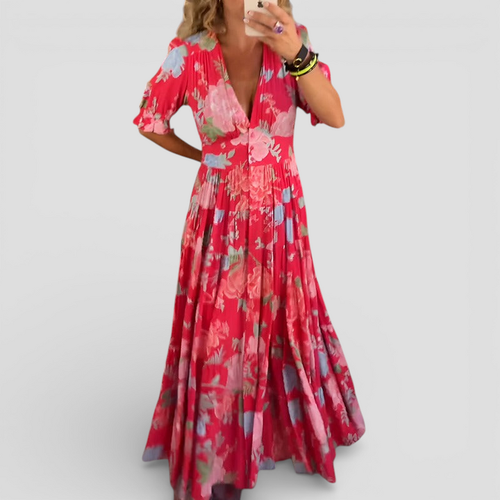 Carine - Blomsterprintet lommekjole med V-hals