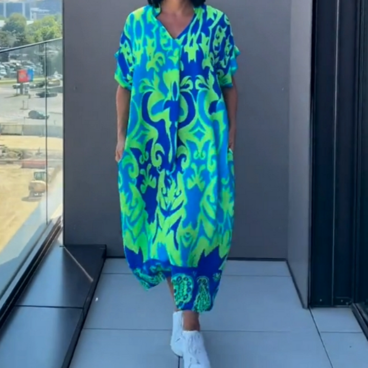 Alma - Afslappet elegant printet kjole med V-hals til kvinder