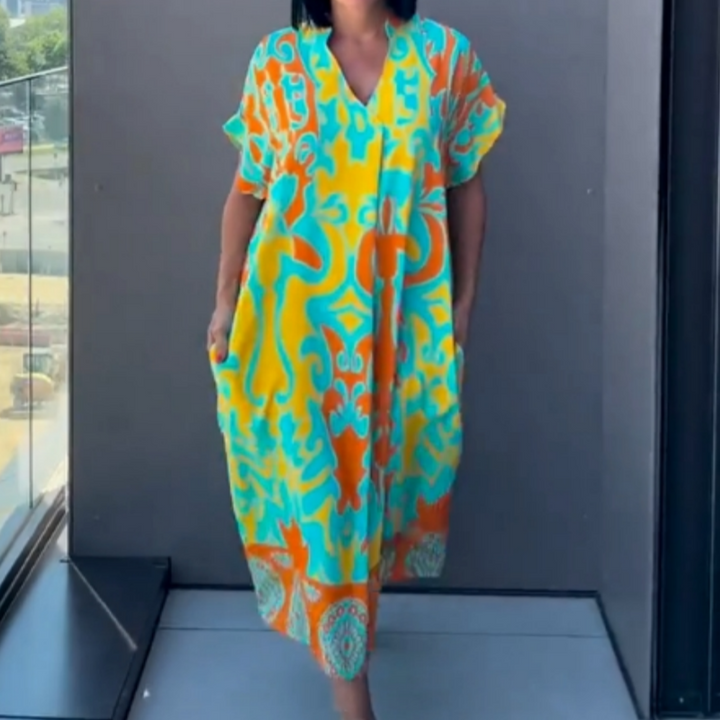 Alma - Afslappet elegant printet kjole med V-hals til kvinder