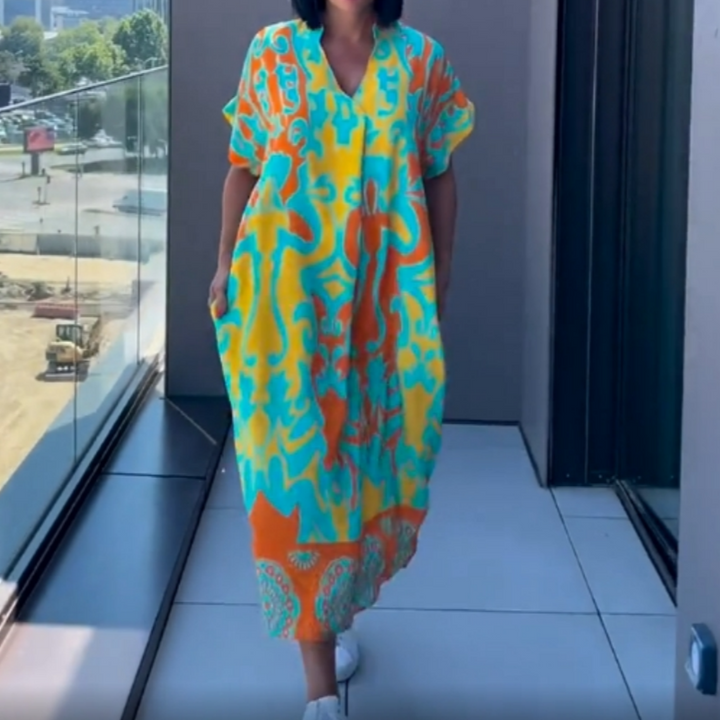 Alma - Afslappet elegant printet kjole med V-hals til kvinder